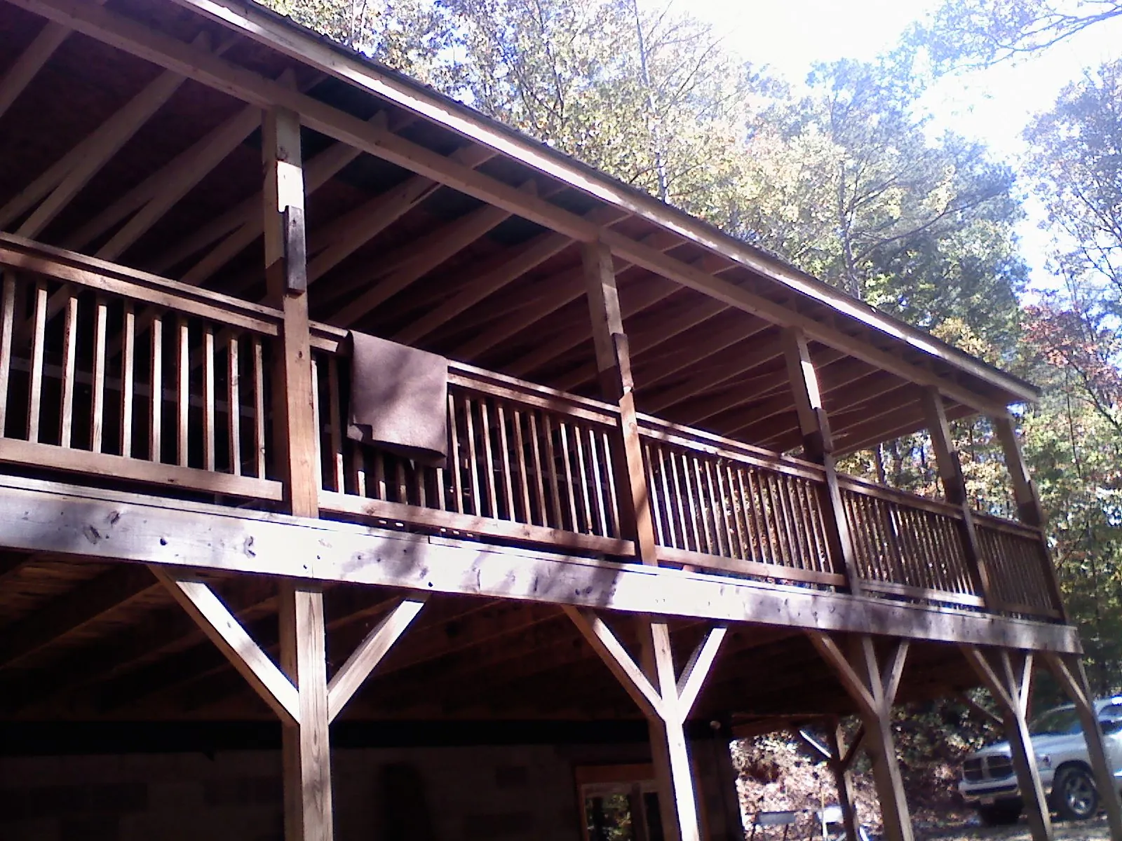 Timber framing under a new elevated porch and deck — Roof Leak Repair in Peak by Roofing Brothers
